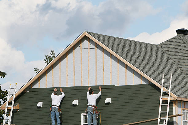 Professional Siding Replacement technician working in Ellicott City, MD